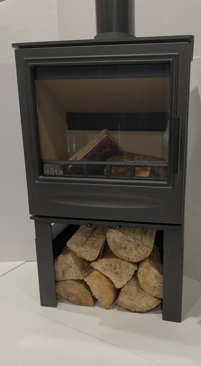 Belina stove on its matching log store